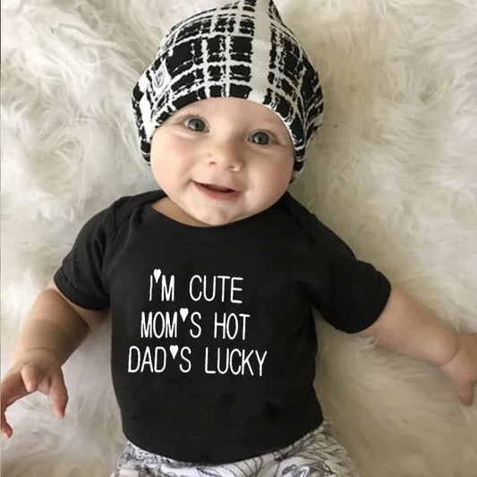 “I’m Cute Mom’s Hot Dad’s Lucky” Newborn Bodysuit – Baby Girl & Boy Clothes